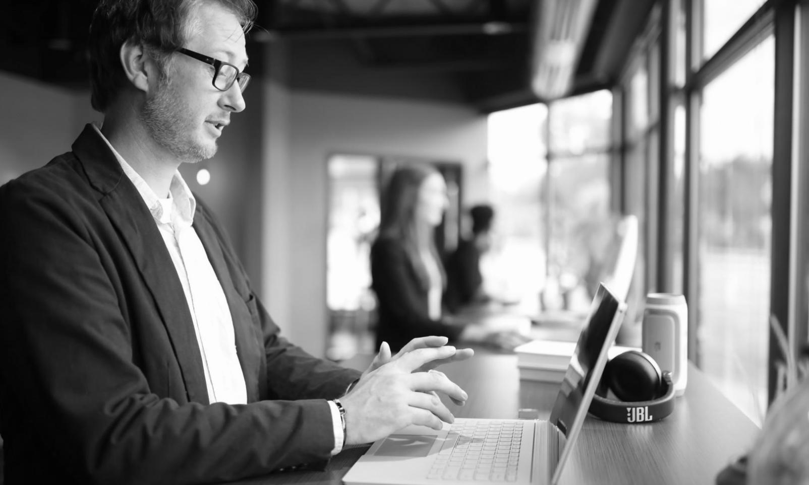 Detailed financial spreadsheets and analysis tools on desk